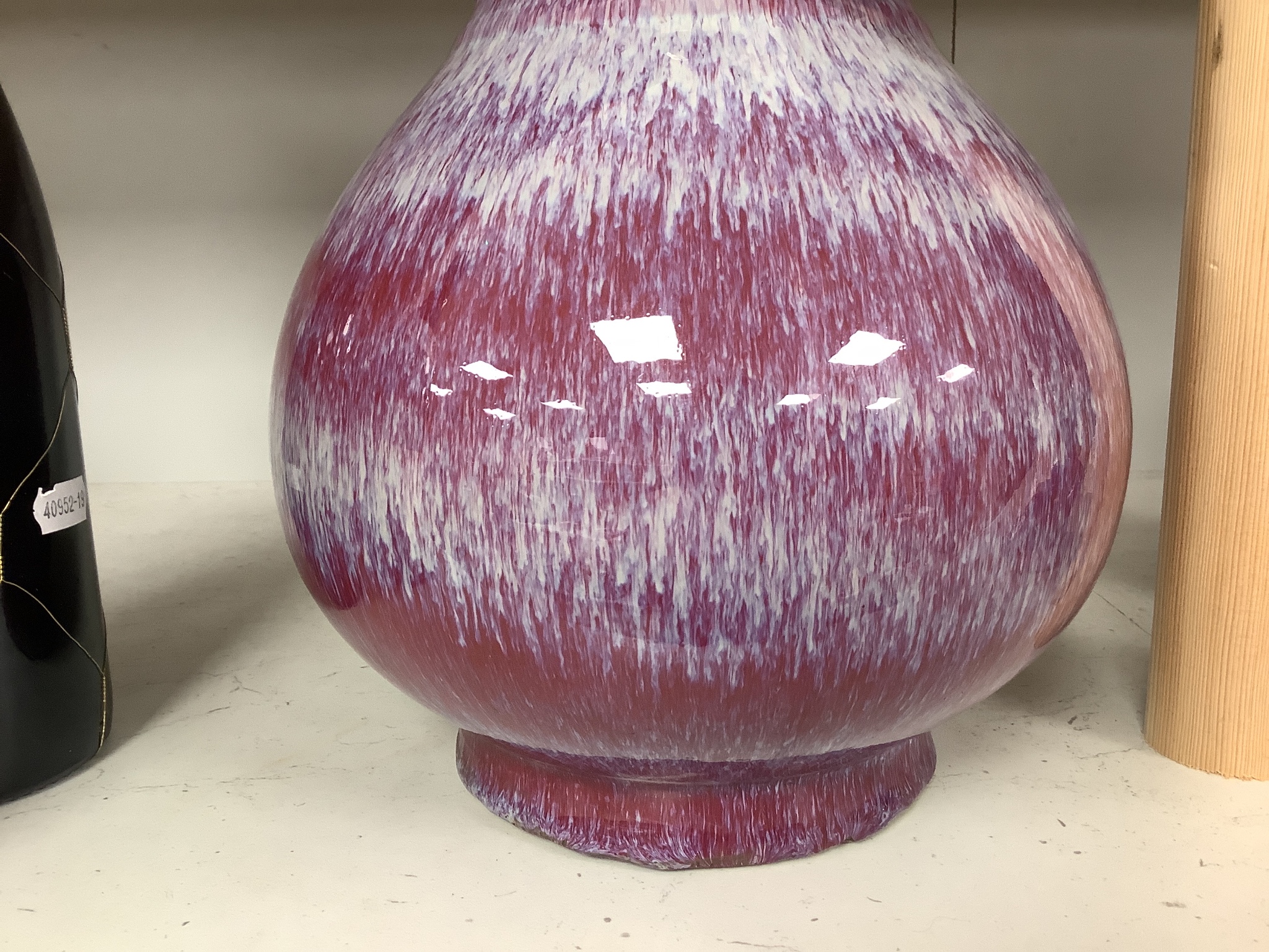 A Chinese crimson flambé glazed vase, 32cm